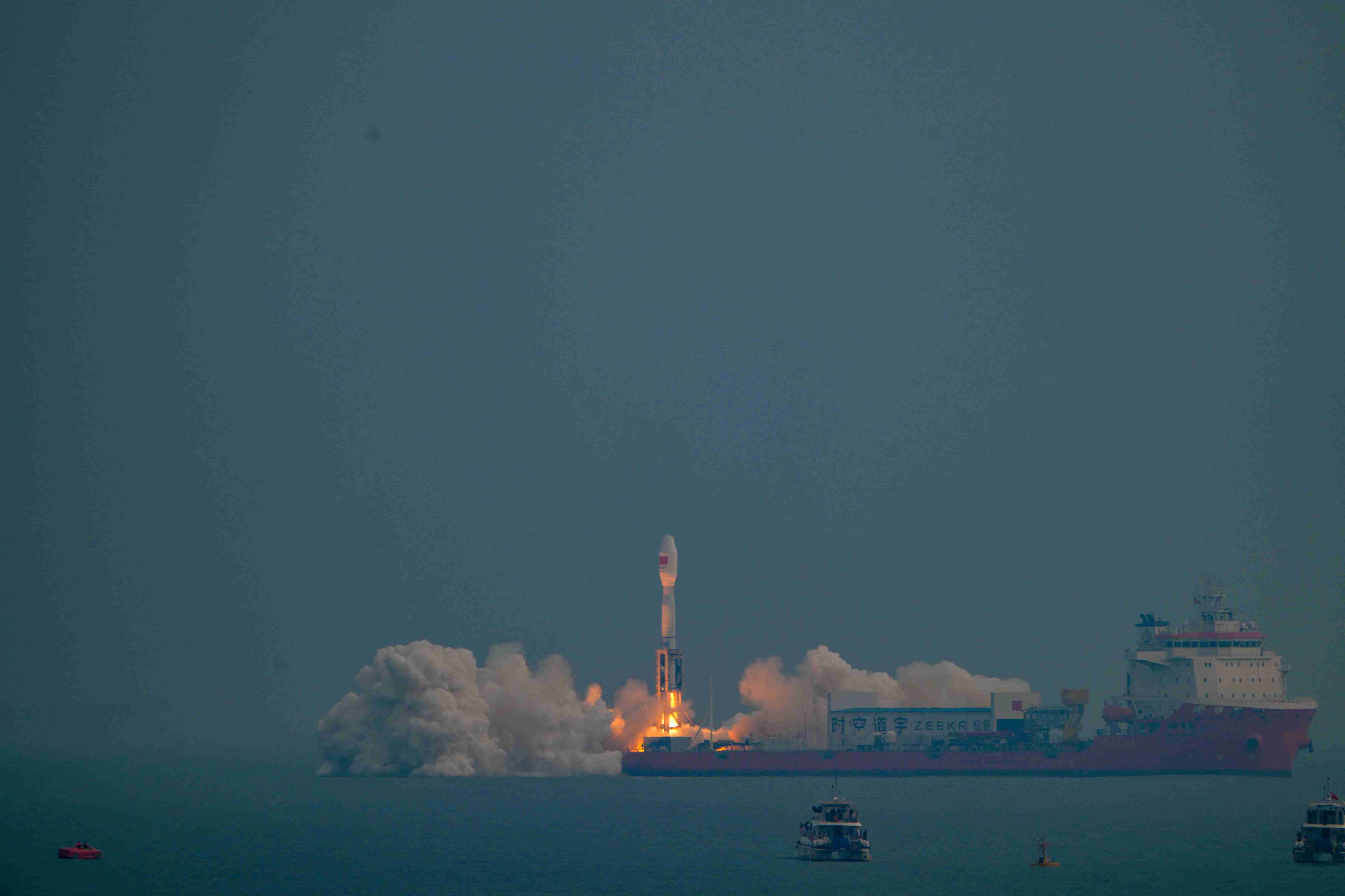 Rocket Launches 12 Satellites Near Rizhao